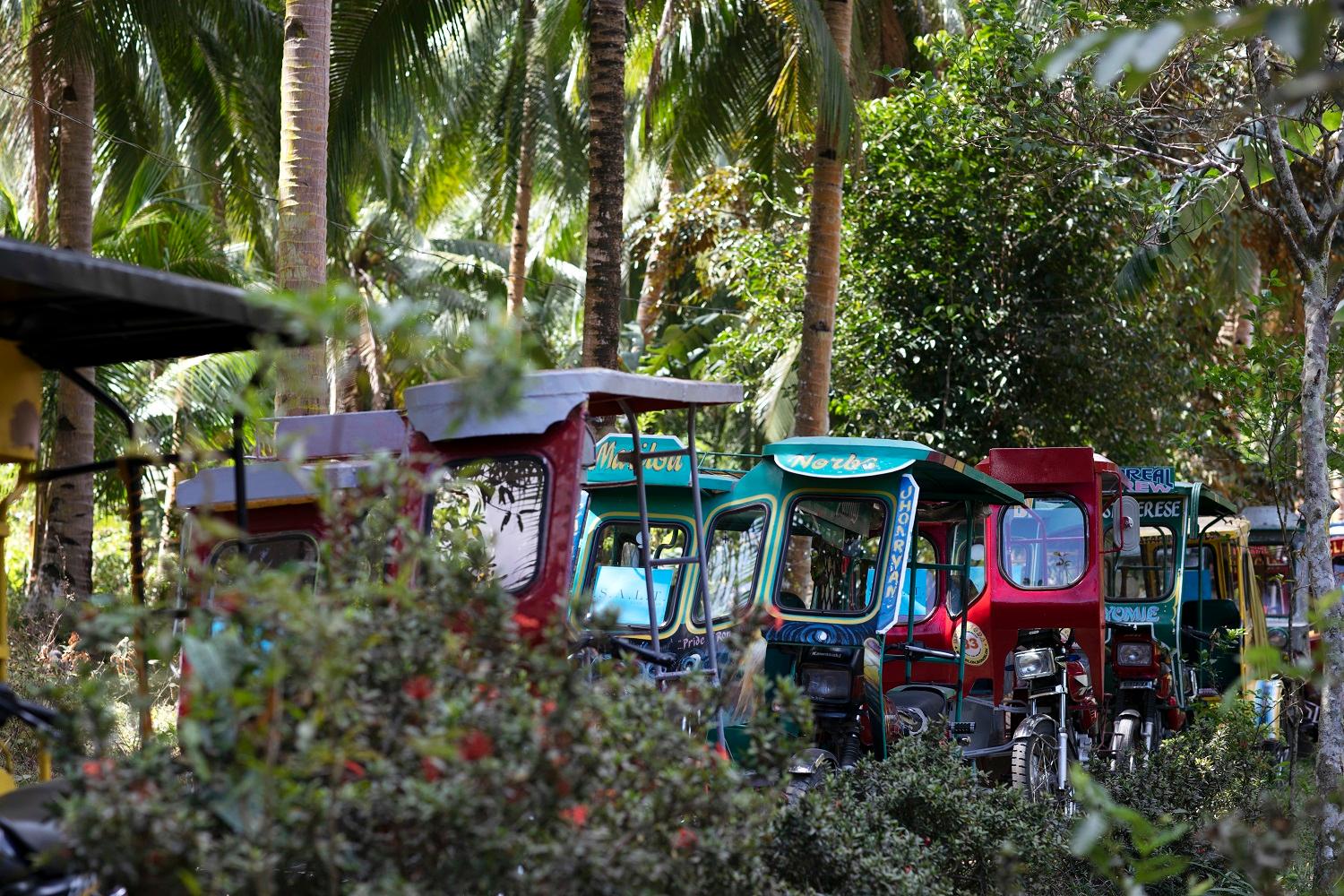 Local rickshaws queue up to transport guests on Romblon Island./Lucia Griggi