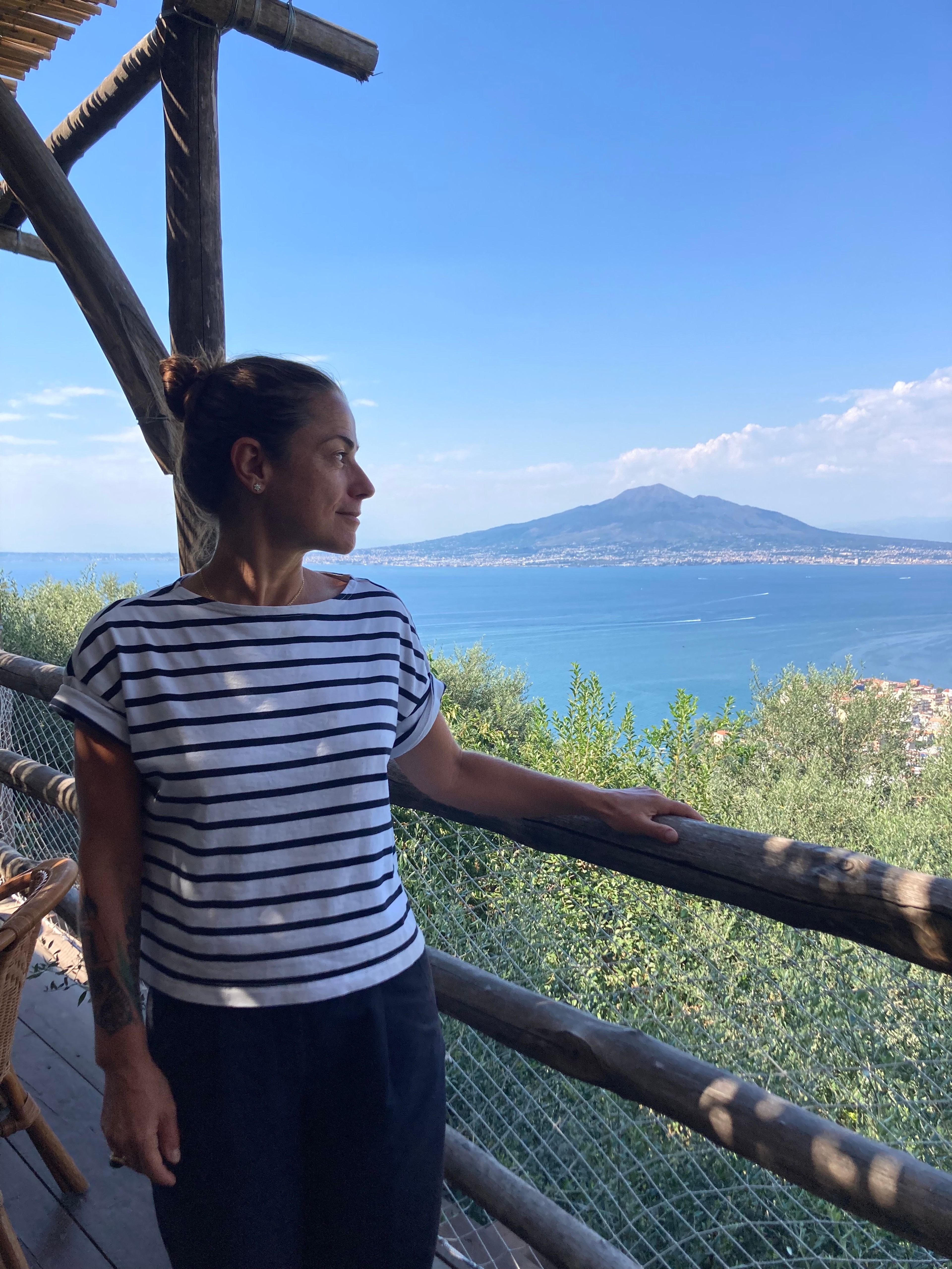 Laura Lazzaroni overlooks the Bay of Naples on a visit to Peppe Guida's agriturismo as part of S.A.L.T. Experiences.