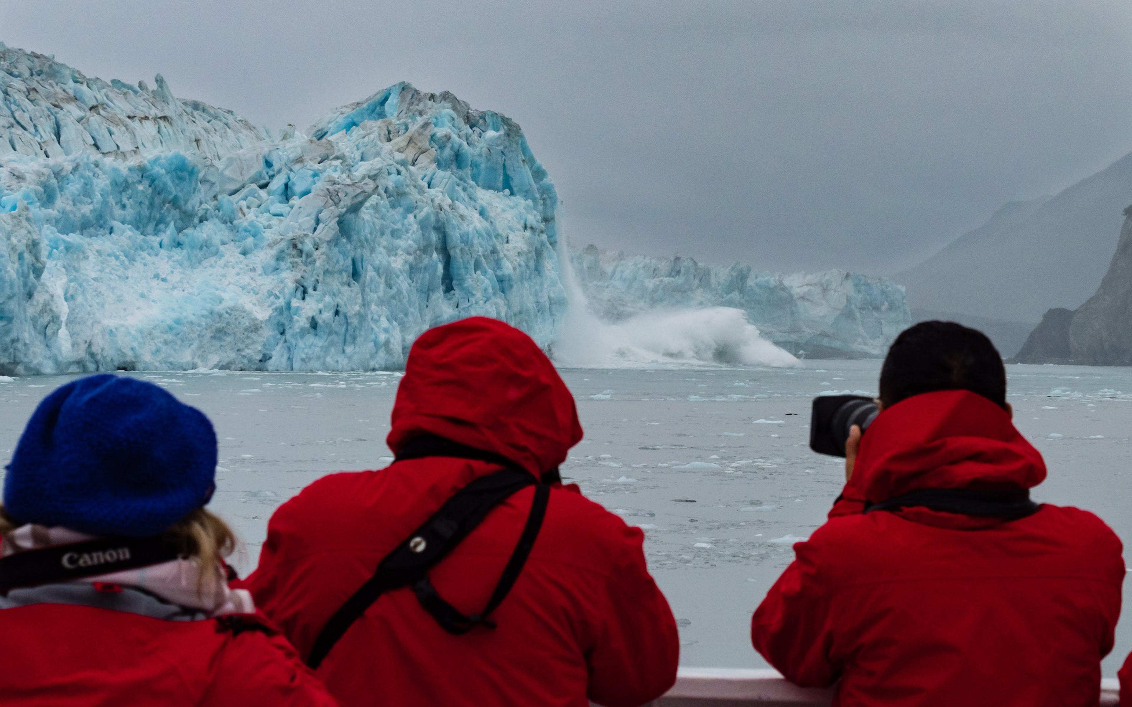 Guests view an incredible calving from the Hubbard Glacier, Alaska/David Jaffe.