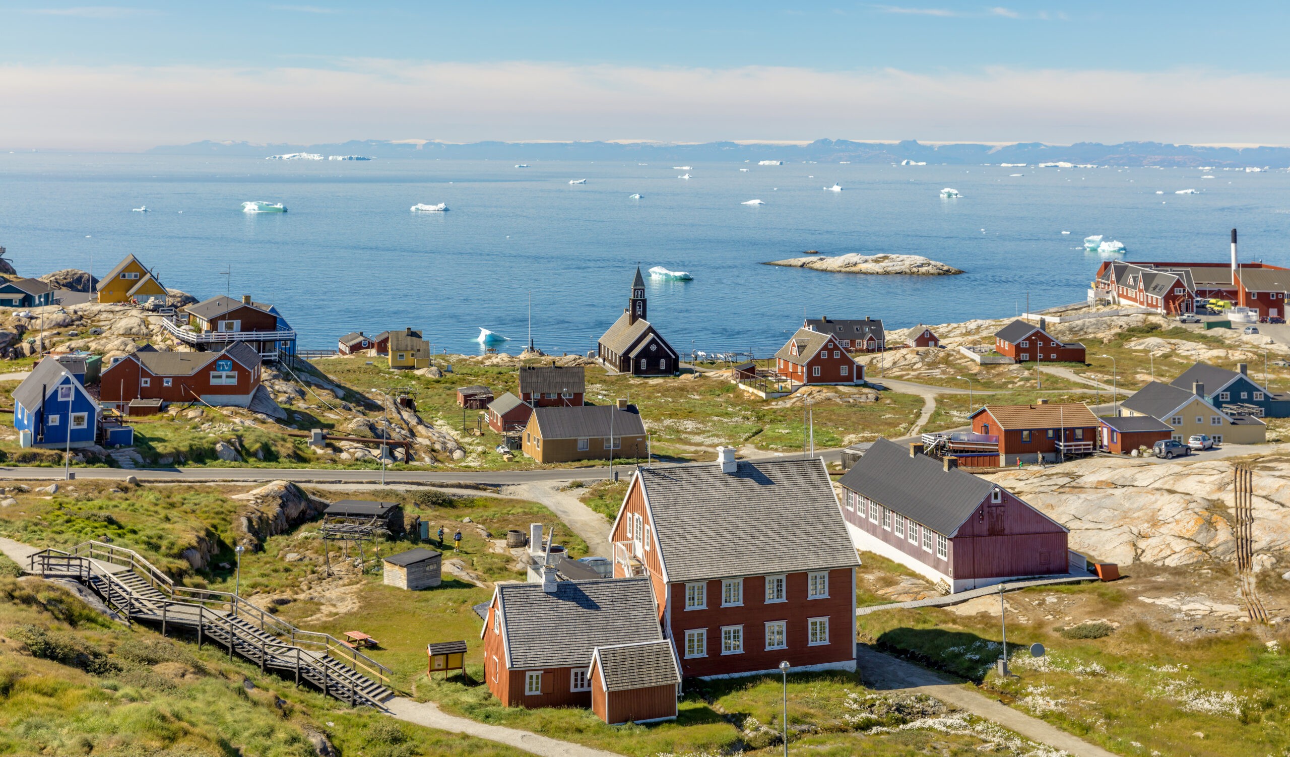 Disco Bay dotted with icebergs on a sunny summer day/Shutterstock