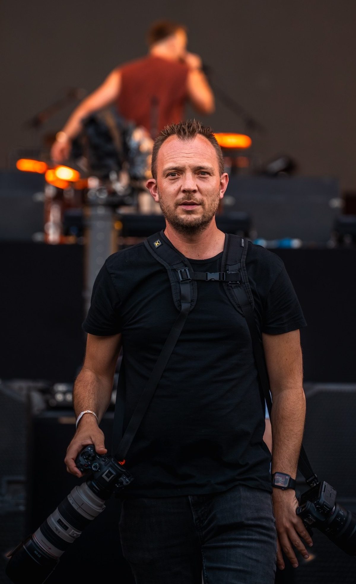 Robin Leltz aan het werk als concertfotograaf