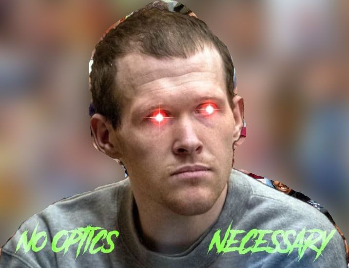 A picture of Brenton Tarrant, whose eyes are shooting red lasers. Text below reads "NO OPTICS NECESSARY".