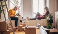 A couple taking a break from unpacking in their new home. picture.