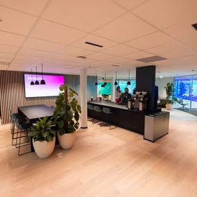 Morrow Bank entrance overview with kitchen and tv screen