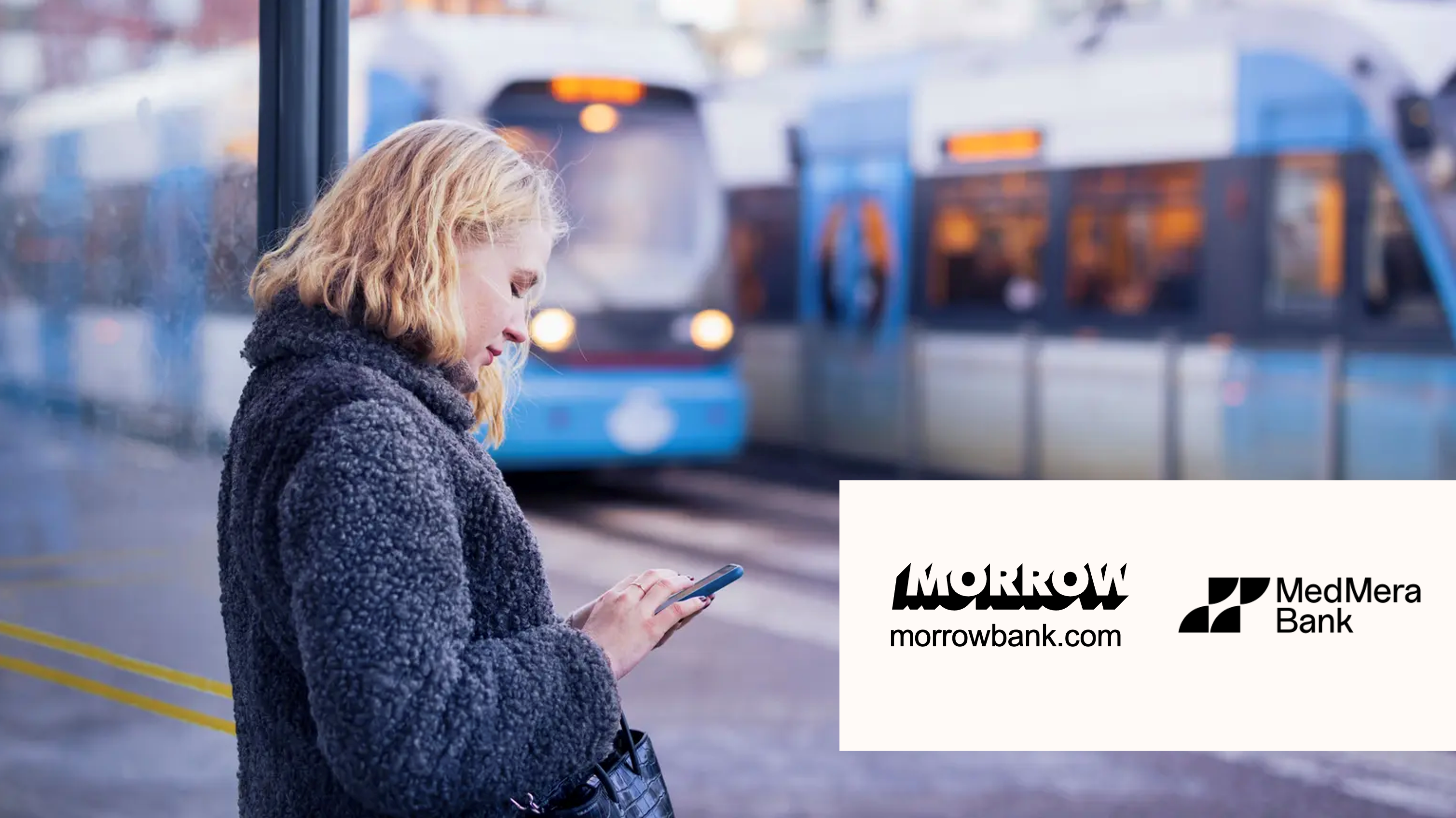 Woman standing at the train station.