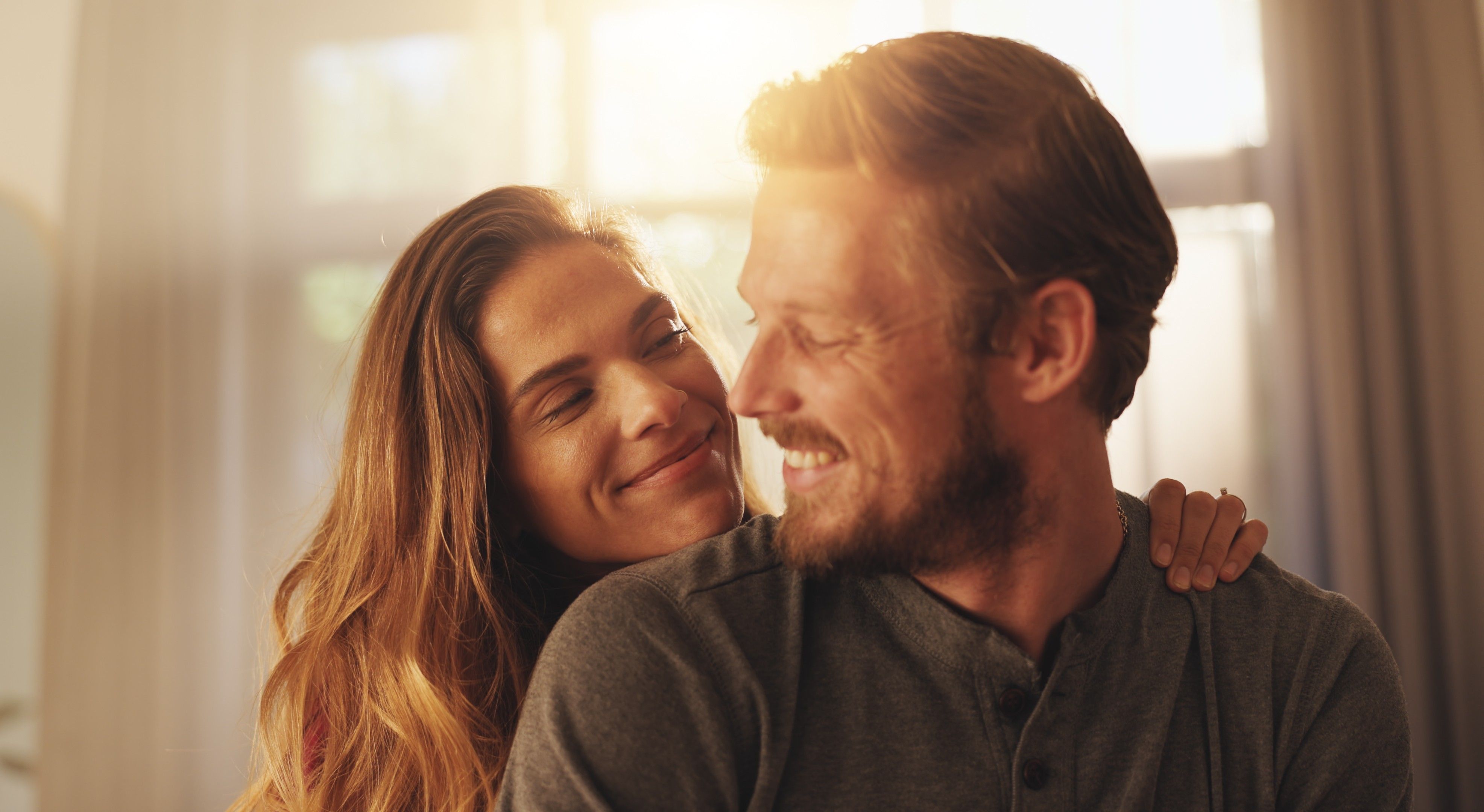 A happy and relaxed couple, looking at each other. picture.
