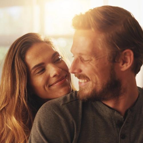 A happy and relaxed couple, looking at each other. picture.