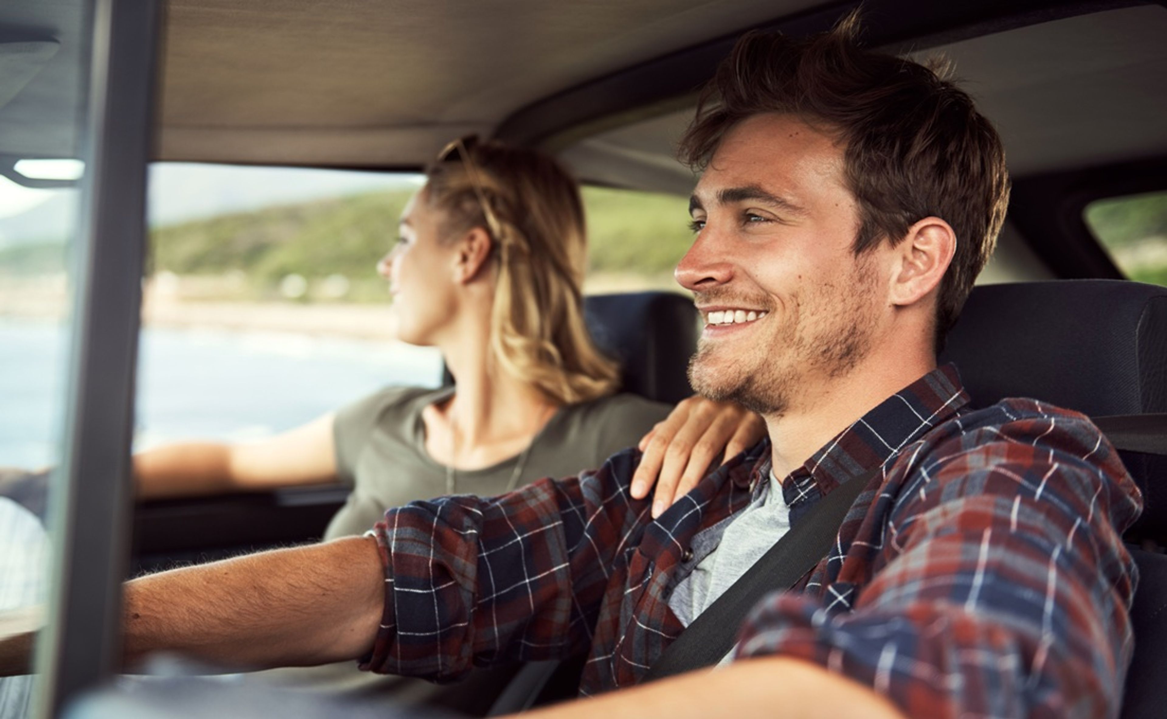 Couple walking through a paddock