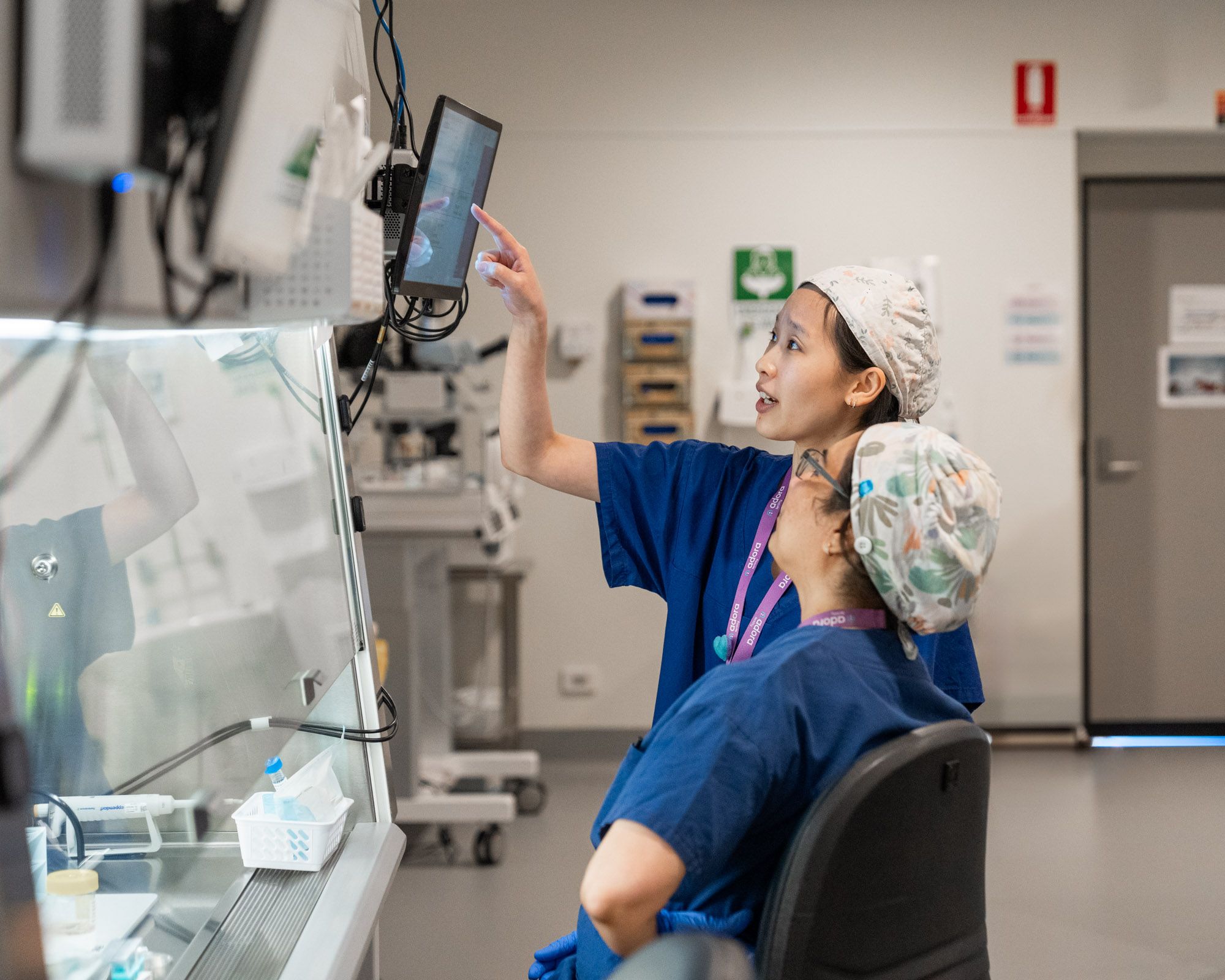 Embryologist grading embryo