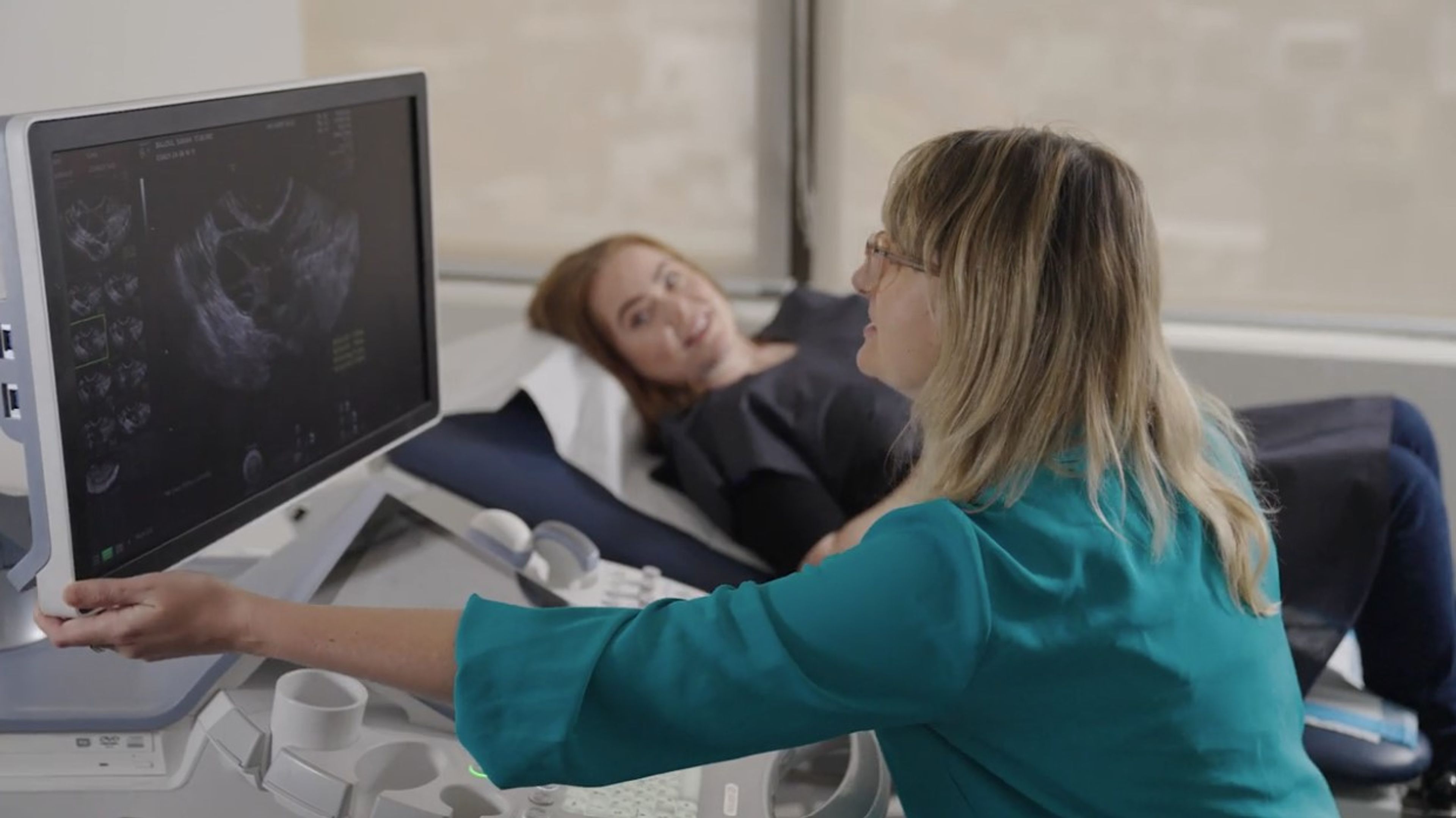 Patient receiving ultrasound from a nurse