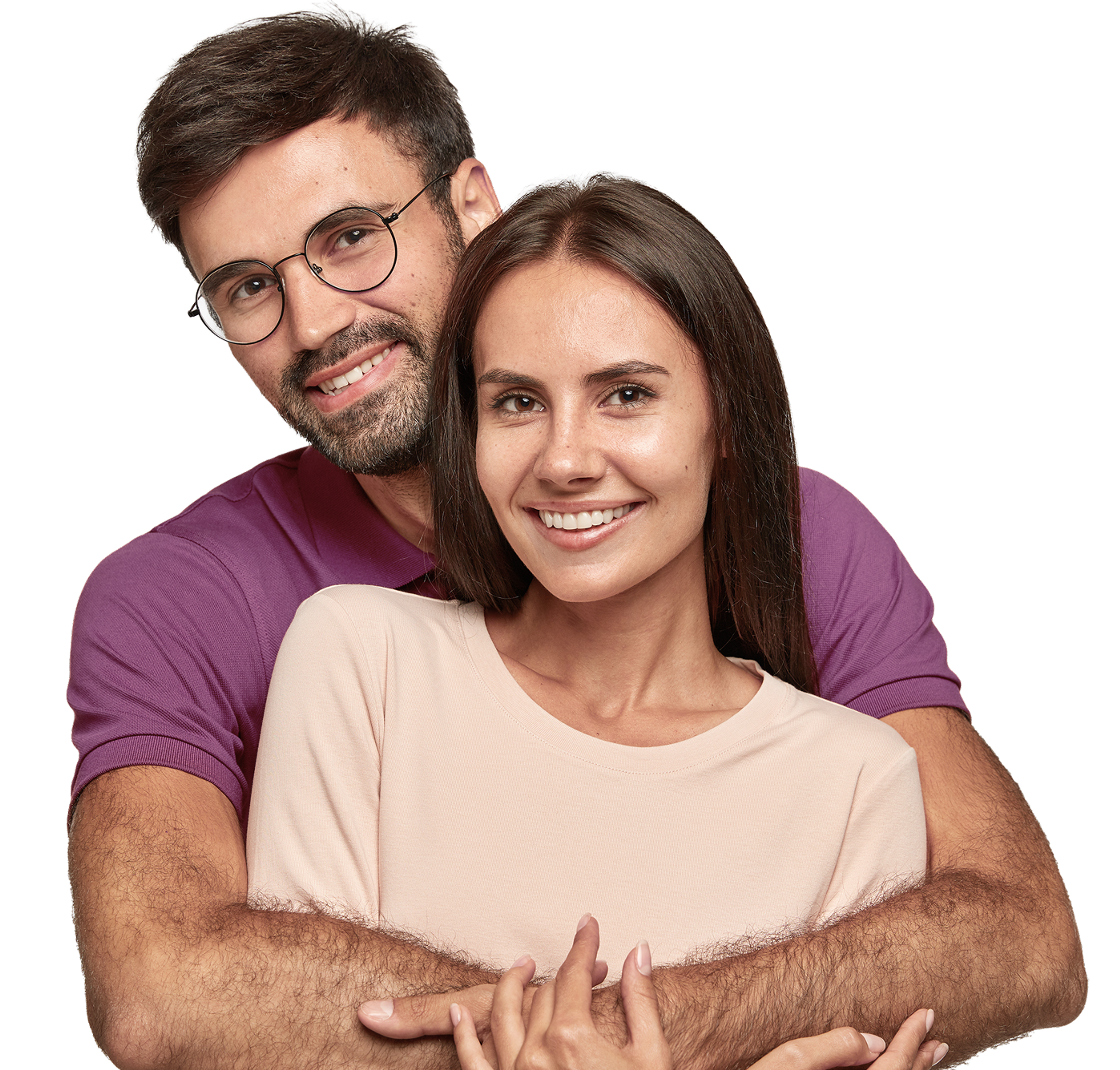 A man with his arms around a woman 