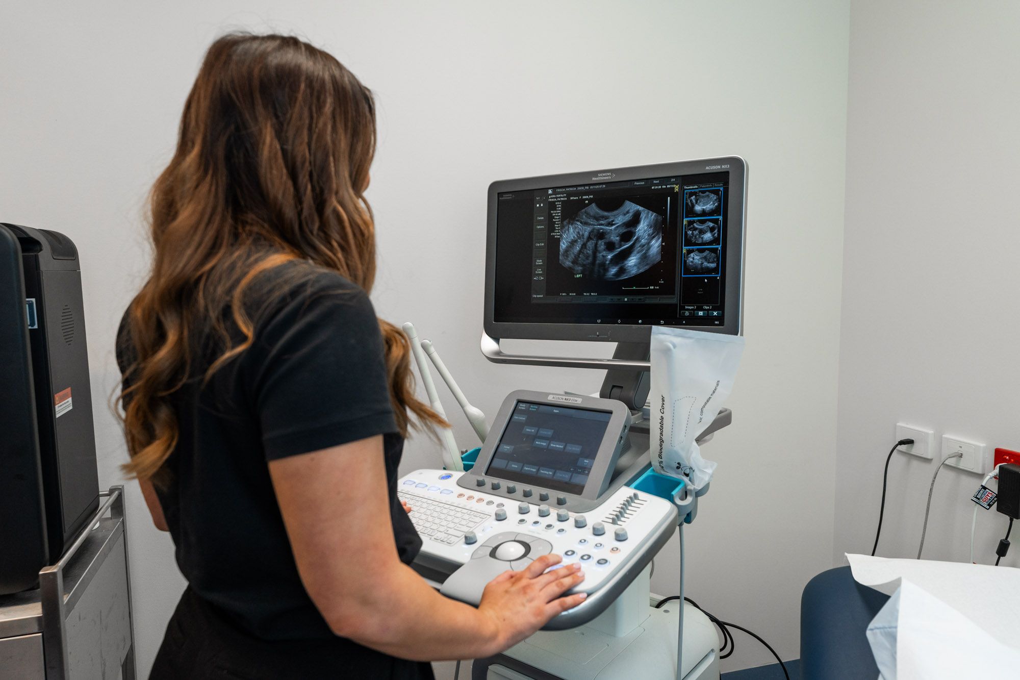 A nurse does a scan for a patient