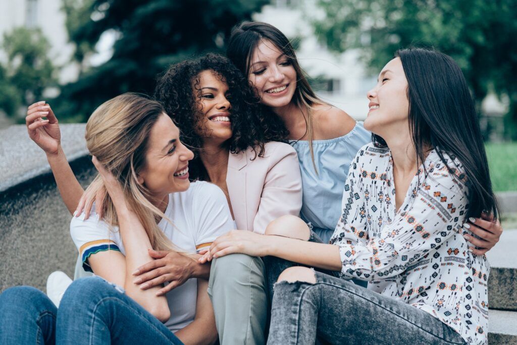 Egg freezing age
limit - image of Best friends chatting and laughing and have fun together outdoor
