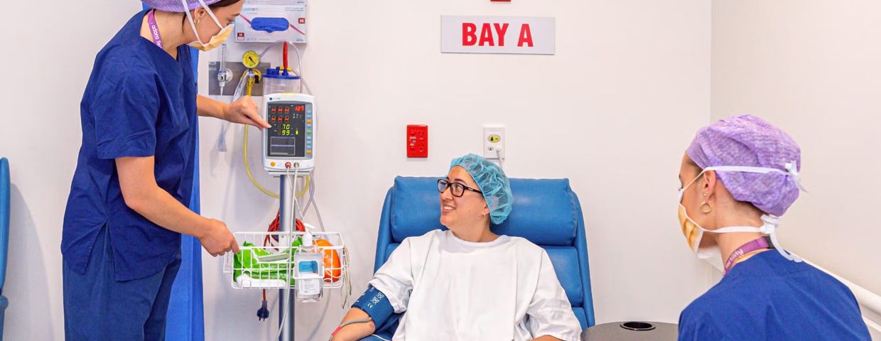 Health care professionals with a patient