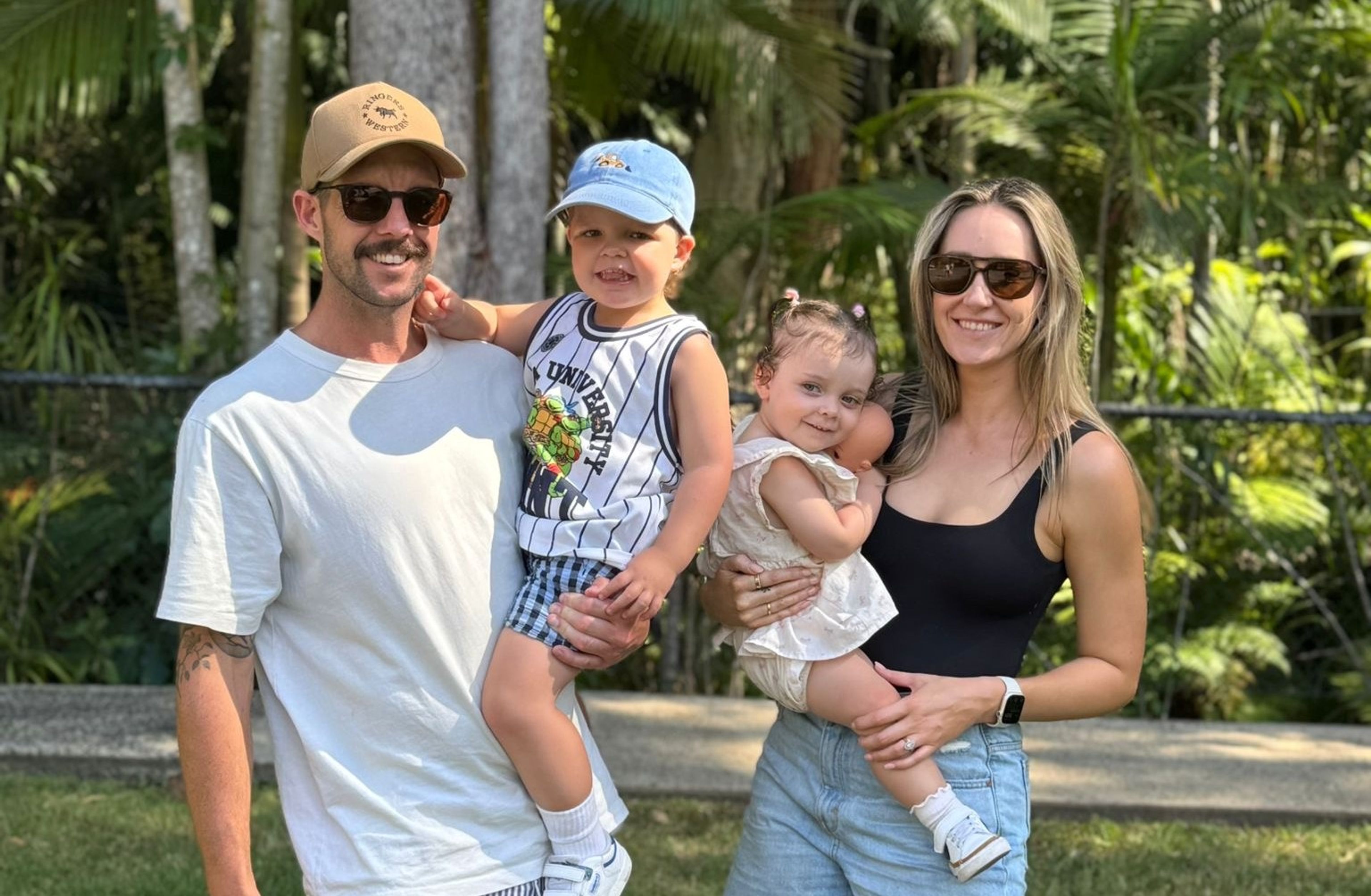 Josh Henshaw and his wife Alice with family