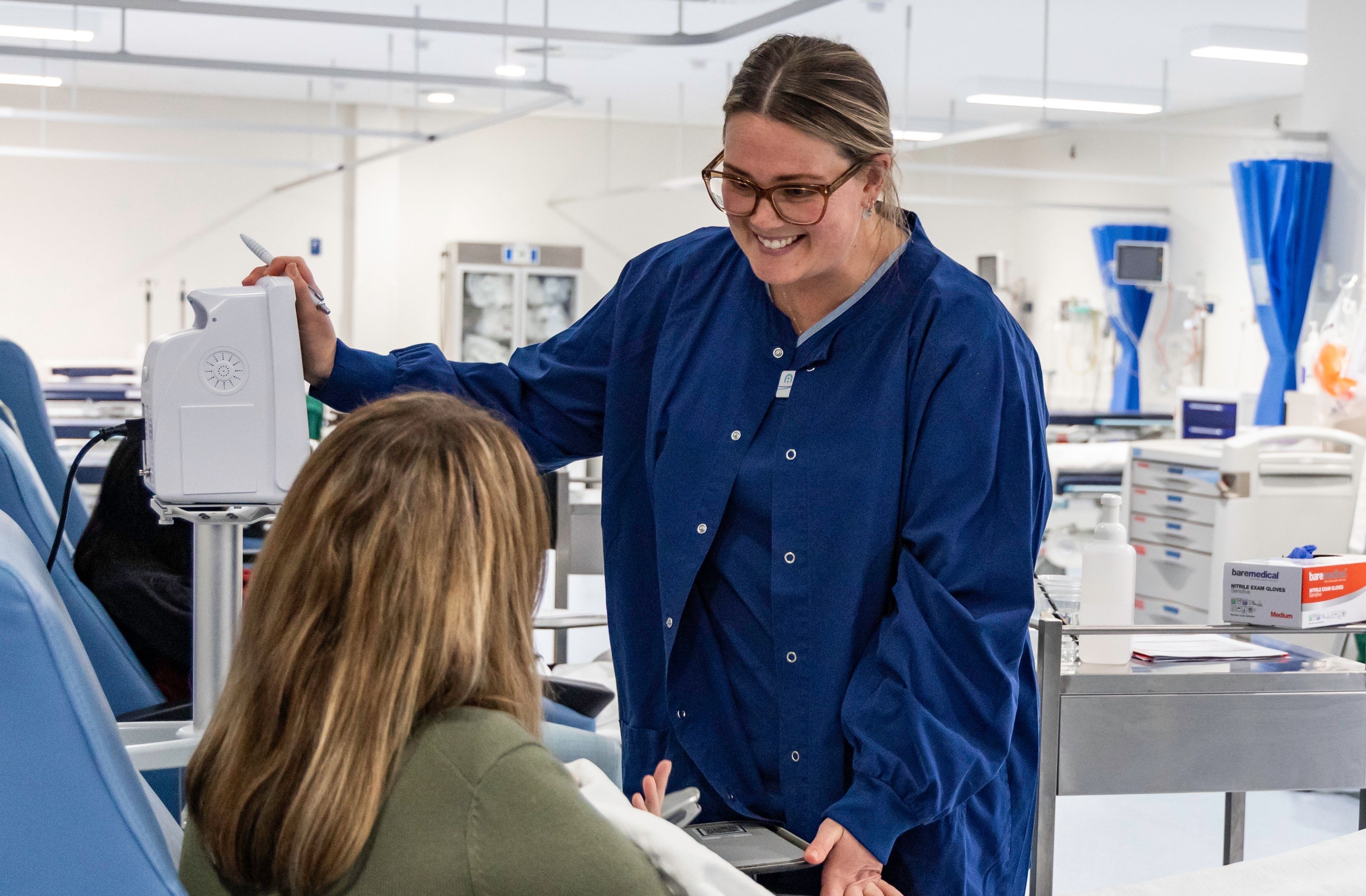 Nurse explaining instructions to a patient
