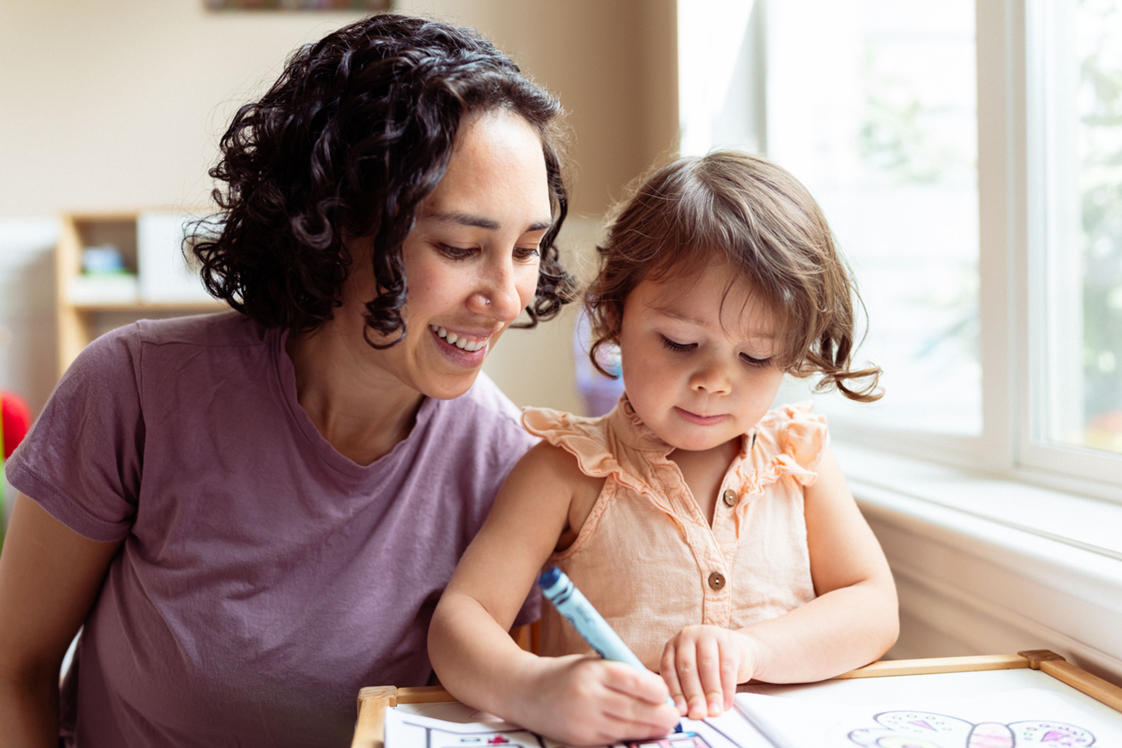 Mother reading with her daughter
