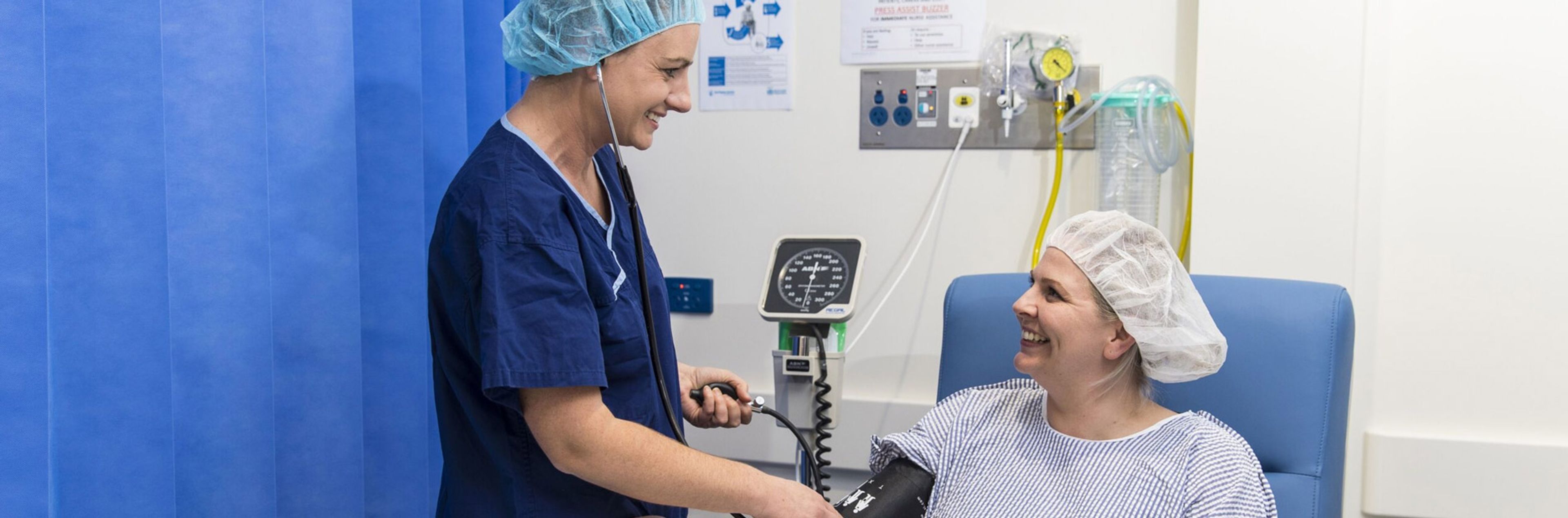 Health care professional checking a patient's blood pressure