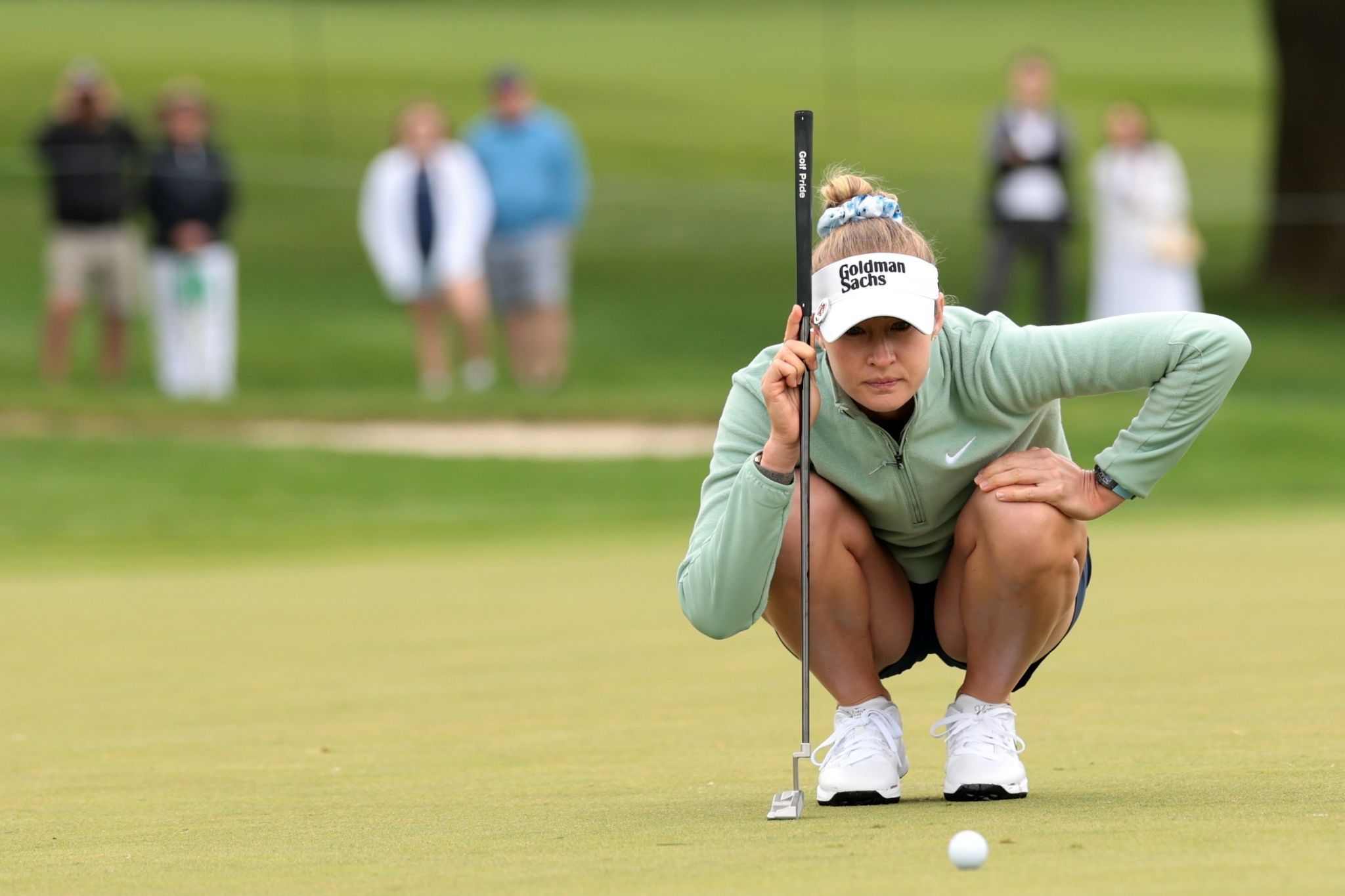 Nelly Korda reads a putt.