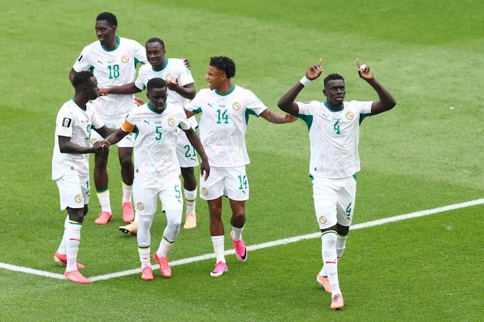Senegal celebrates after a goal. 