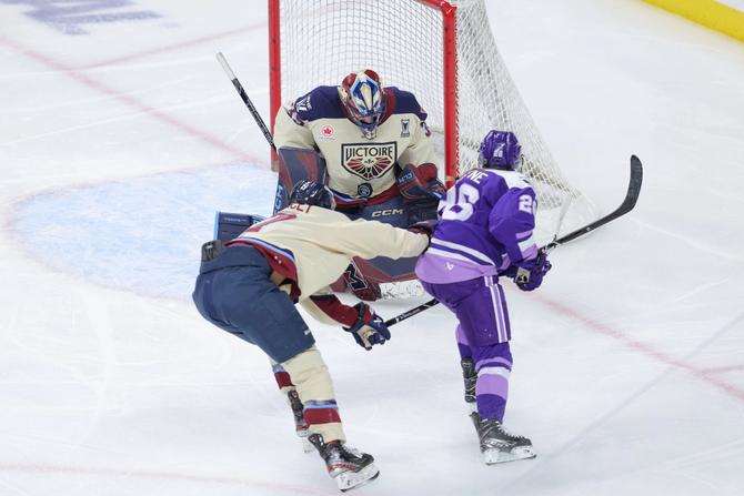 Montréal Victoire goaltender Ann-Renée Desbiens (35) makes a save on a shot from Minnesota Frost forward Kendall Coyne Schofield (26).