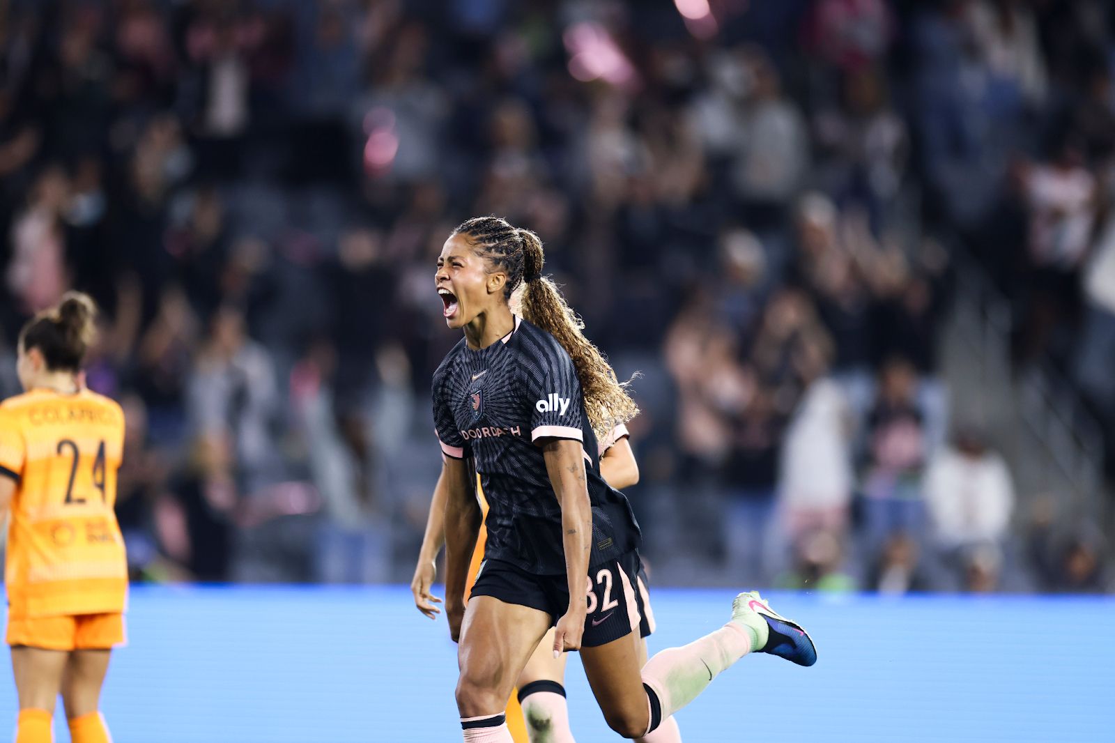 Sveindís Jónsdóttir celebrates after scoring a goal.