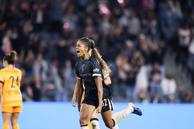 Sveindís Jónsdóttir celebrates after scoring a goal.