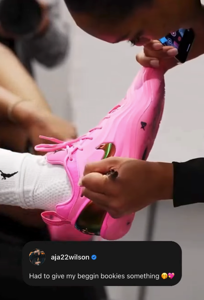 Four-time WNBA MVP A'ja Wilson giving out her signature shoe to Las Vegas Aces teammates. 💖