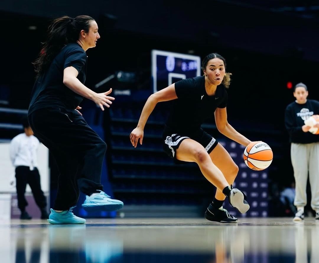 Toronto Tempo rookie Kiki Rice drives to the basket while being defended by Marina Mabrey.