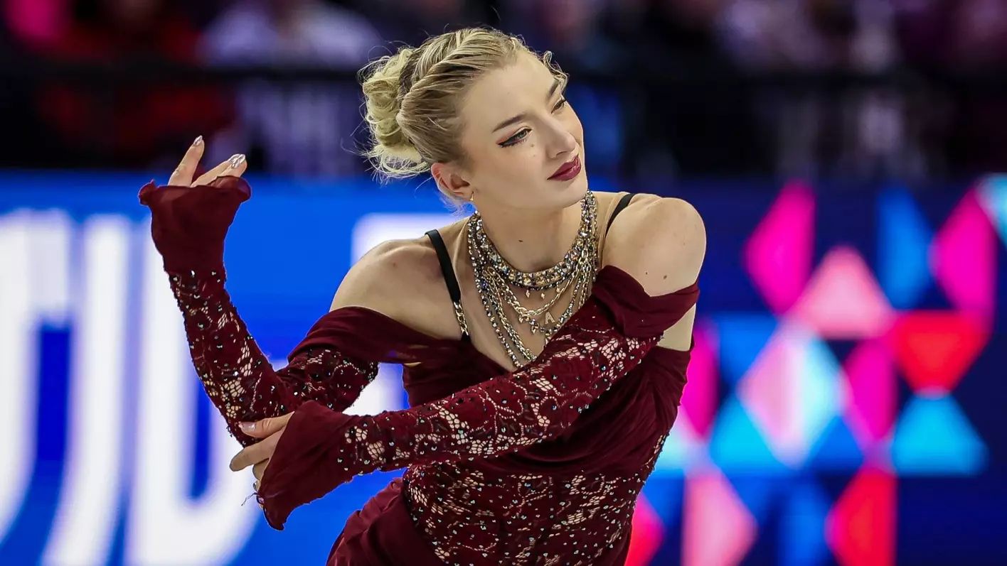 Amber Glenn glides on the ice.