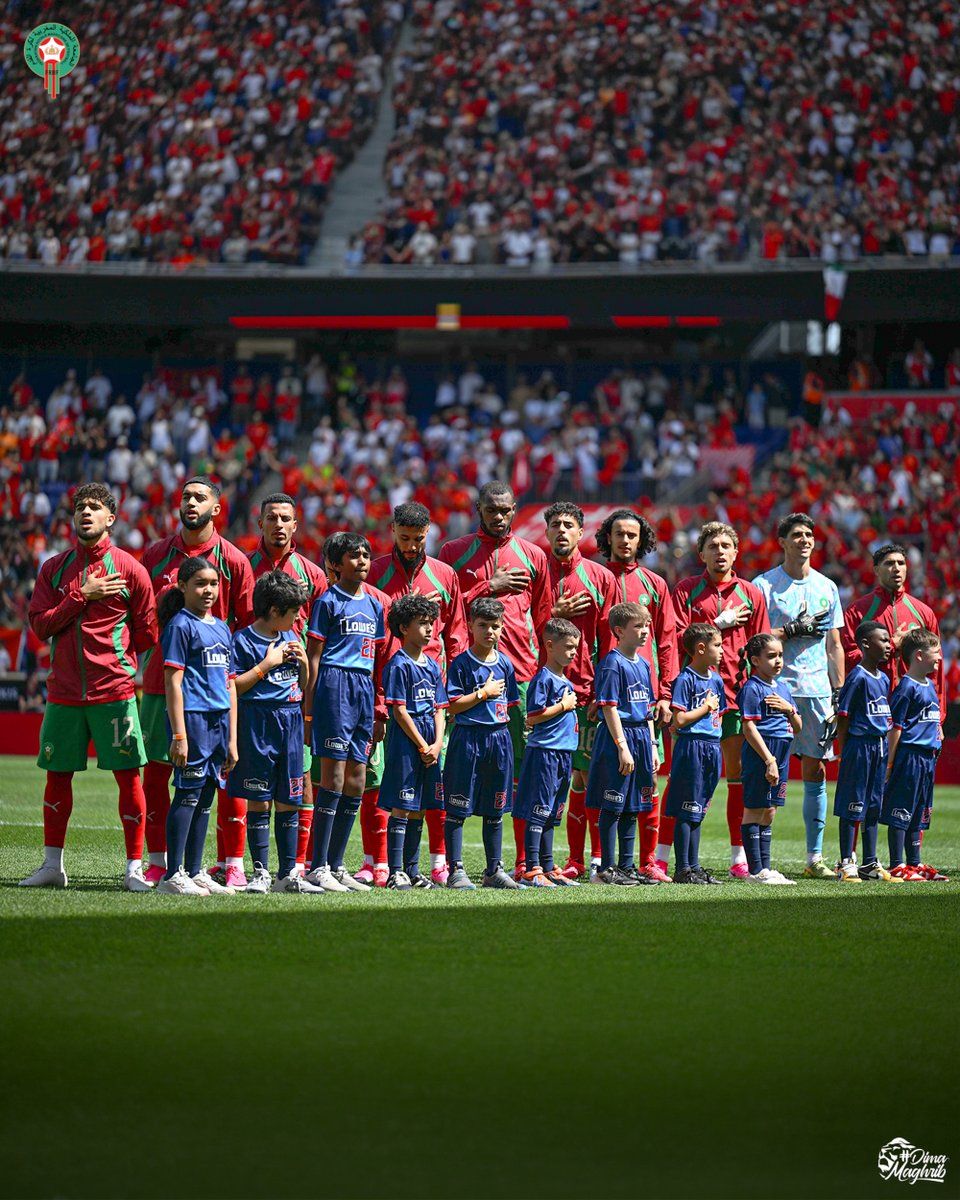 Morroccan players sing their national anthem before a friendly against Norway.