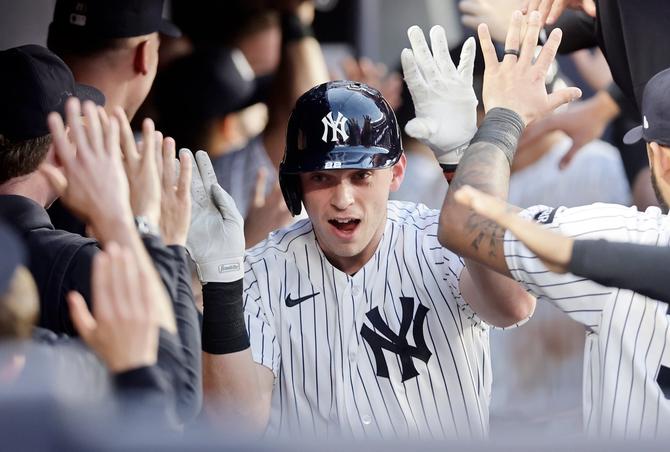 NY Yankee Ben Rice celebrates a home run