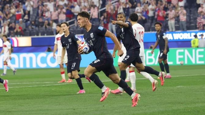 Midfielder Sebastian Berhalter carries the ball back up the field after scoring against Türkiye.