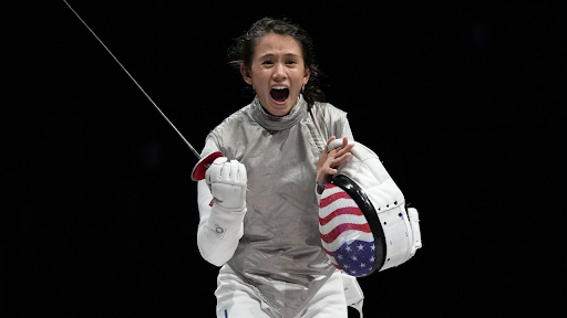 U.S. women’s foil fencer Lee Kiefer celebrates winning gold at the 2021 Olympics.