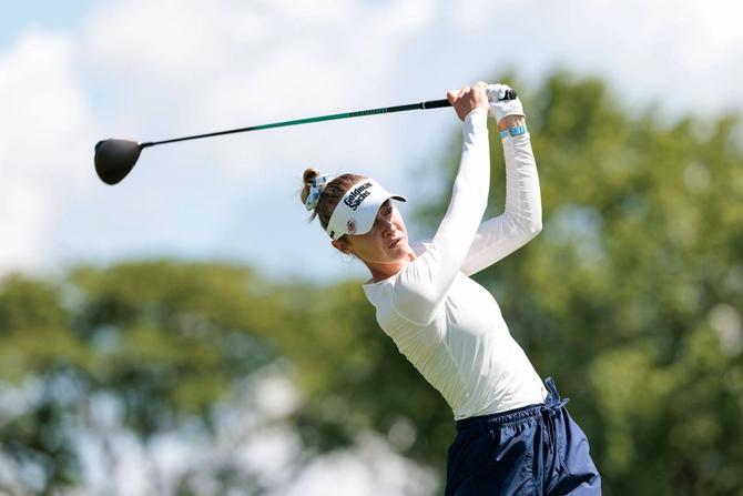 Nelly Korda hits a tee shot.
