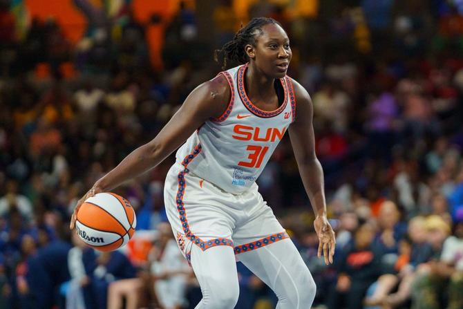 The Connecticut Sun’s Tina Charles dribbles the ball.