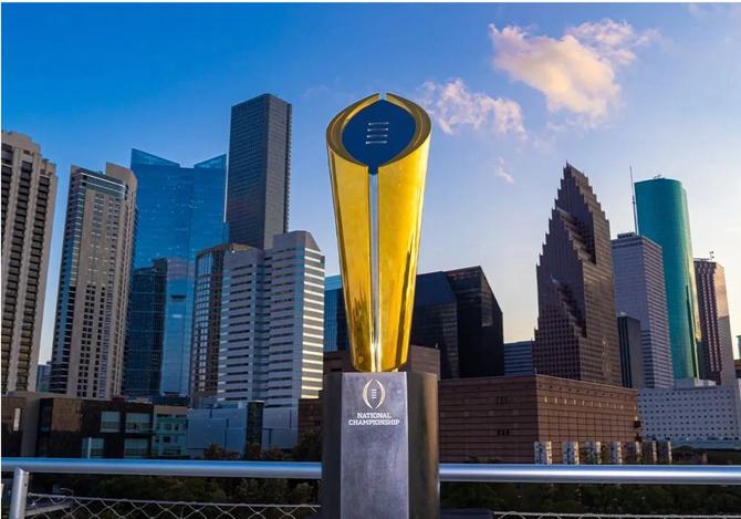 The College Football Playoff National Championship Trophy in front of the Houston, Texas, skyline.