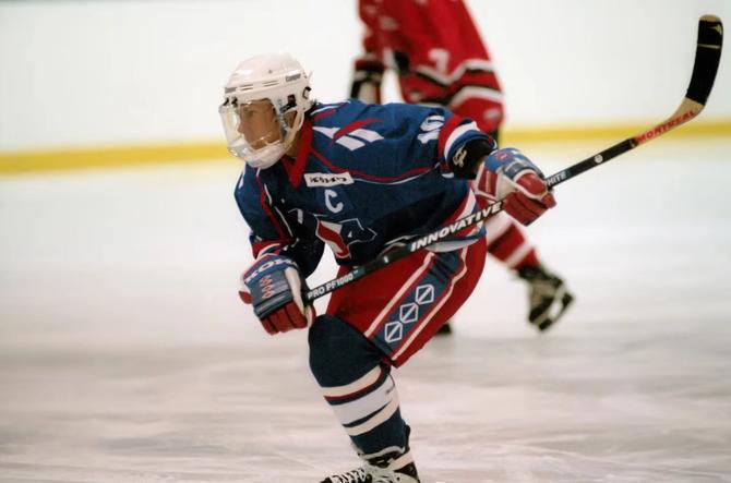 Cindy Curley skates in her Team USA jersey.
