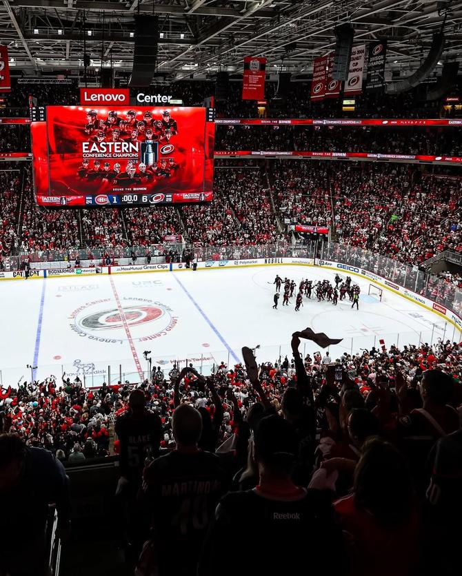 Fans at Lenovo Center celebrate after the Hurricanes clinched their spot in the Stanley Cup finals.