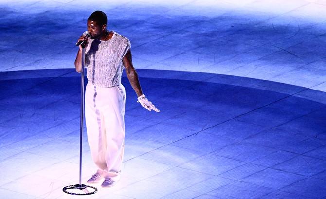 Usher performs at the Super Bowl halftime show.
