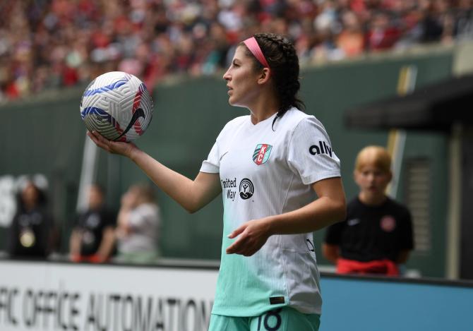 Kansas City Current defender Izzy Rodriguez (18) looks to throw-in the ball during an NWSL match between the Portland Thorns and Kansas City Current on June 23, 2024 at Providence Park in Portland, Oregon.