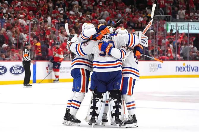 Edmonton Oilers celebrate after scoring in overtime to win Game 4 of the Stanley Cup Final.