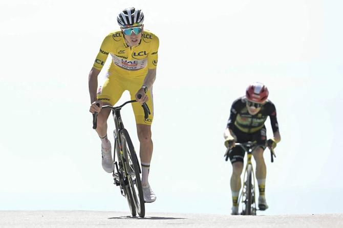 Tadej Pogačar races at the Tour de France.
