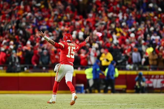 Kansas City quarterback Patrick Mahomes celebrates with his arms outstretched.