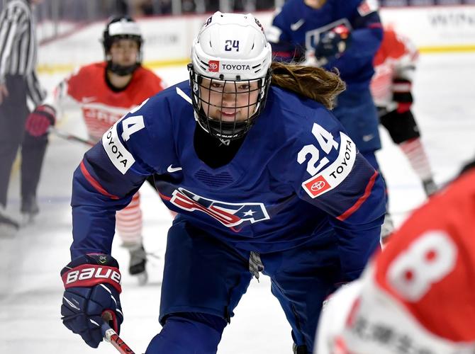 Joy Dunne #24 of the United States chases the puck during a game against Japan during the 2024 IIHF Women's World Championship at Adirondack Bank Center on April 11, 2024, in Utica, New York.