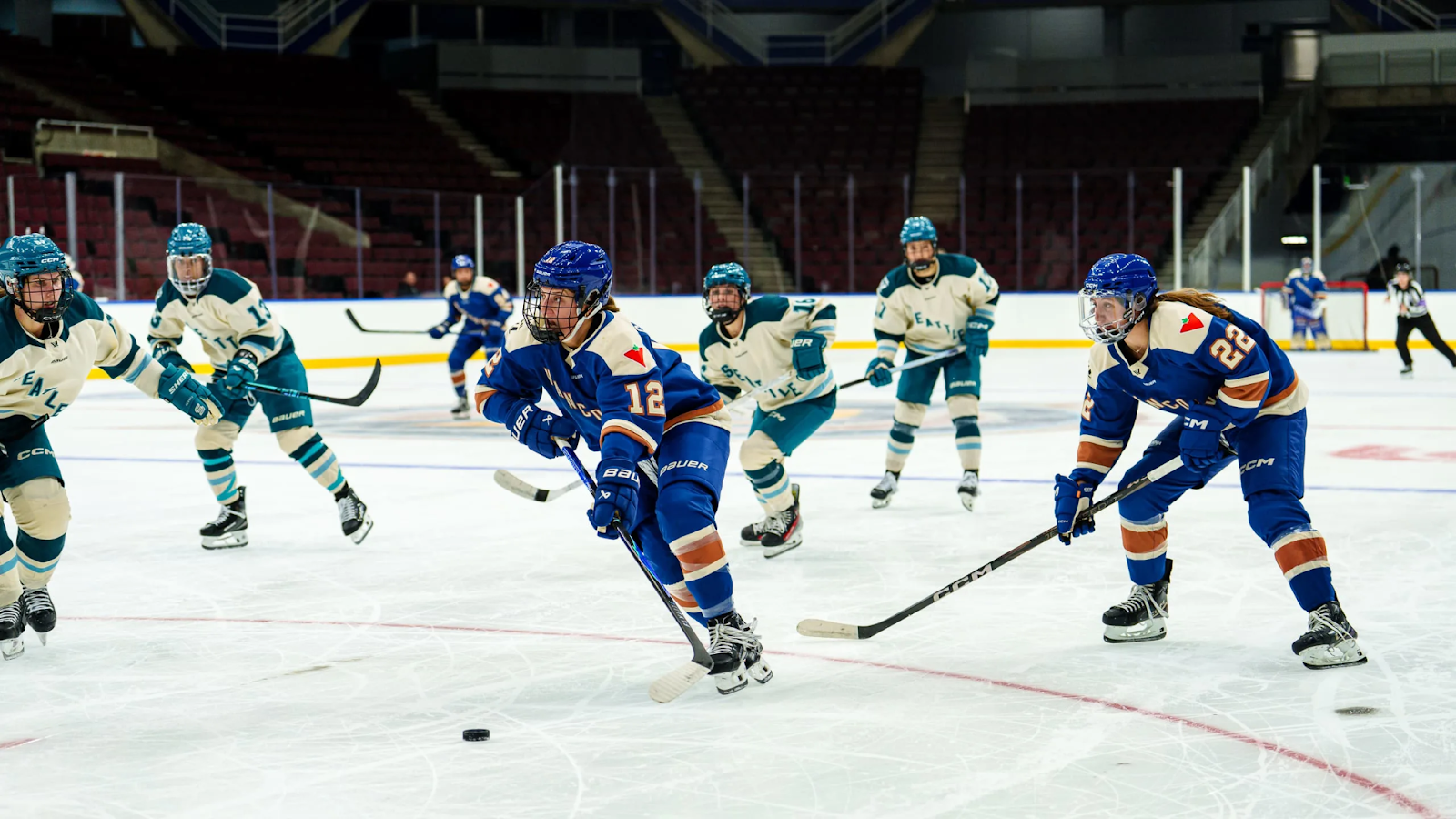 Vancouver Goldeneyes forward Jenn Gardiner skates up this ice with the puck.