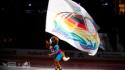 The Colorado Avalanche mascot, Bernie the St. Bernard, skates with pride-themed flag.