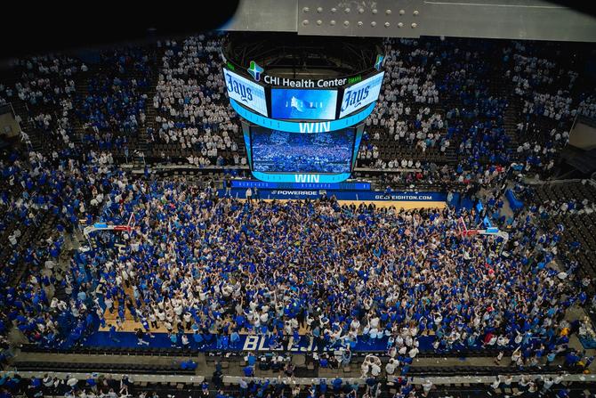 No. 15 Creighton men’s basketball fans storm the court after the Bluejays upset No. 1 UConn last night.