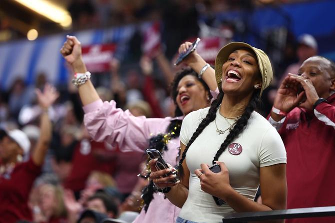 WNBA player and former South Carolina Gamecock A'ja Wilson reacts with other South Carolina fans in the third quarter against the UConn Huskies the 2022 NCAA Women's Basketball Tournament National Championship game at Target Center on April 03, 2022 in Minneapolis, Minnesota.
