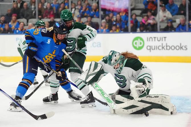 Toronto Sceptres shoot the puck against the Boston Fleet.